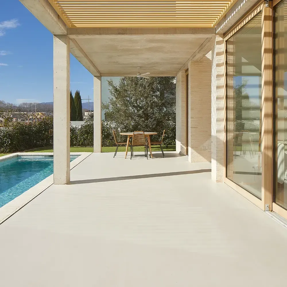 An outdoor area paved in microcement