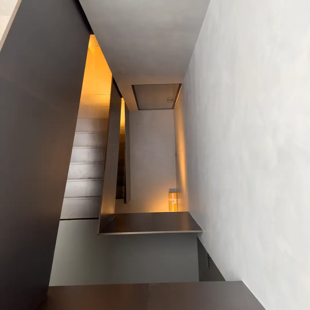 A staircase finished in Microcemento®
