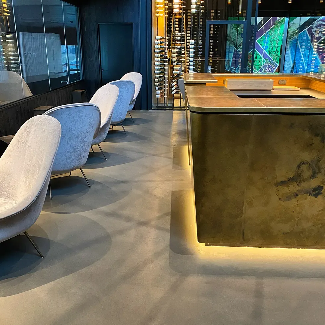 A bar counter finished in Real Metals®