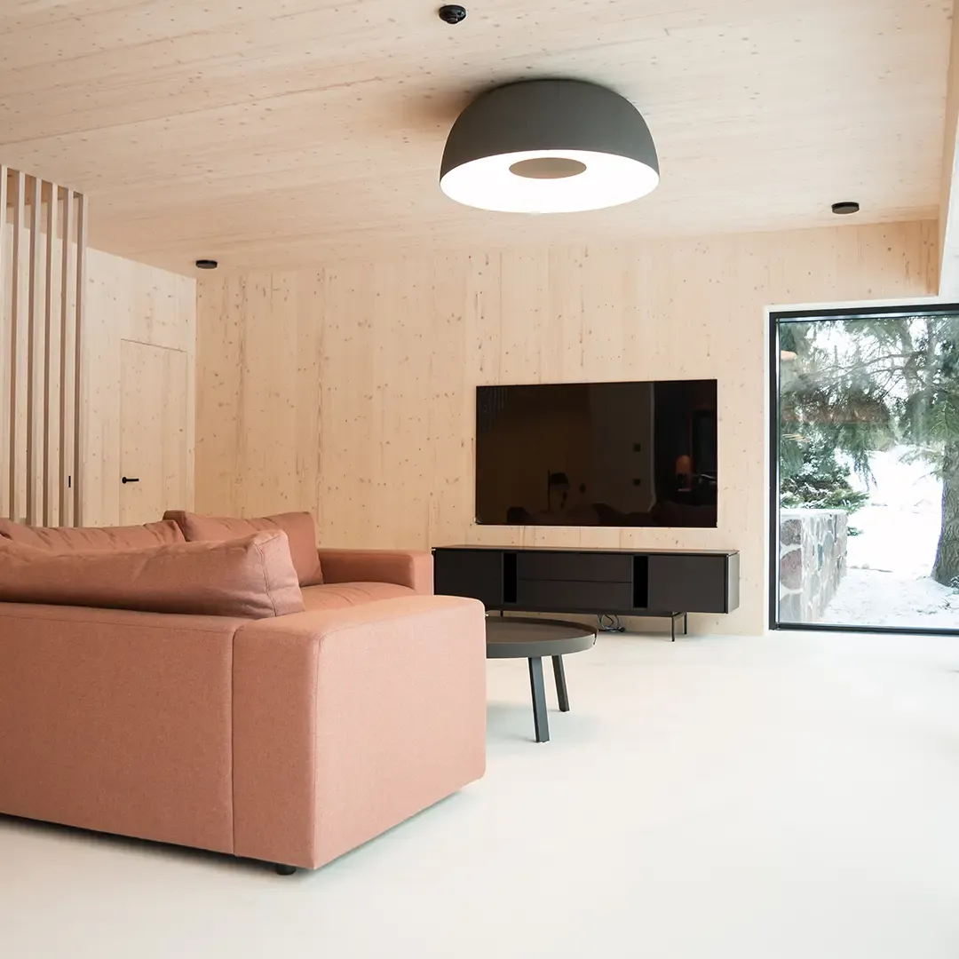 A living room with an underfloor heated Summery® floor